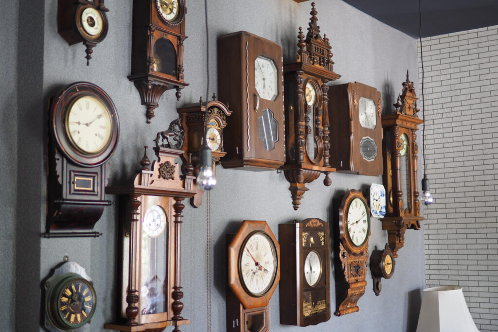 Antique Wooden Clocks on Wall